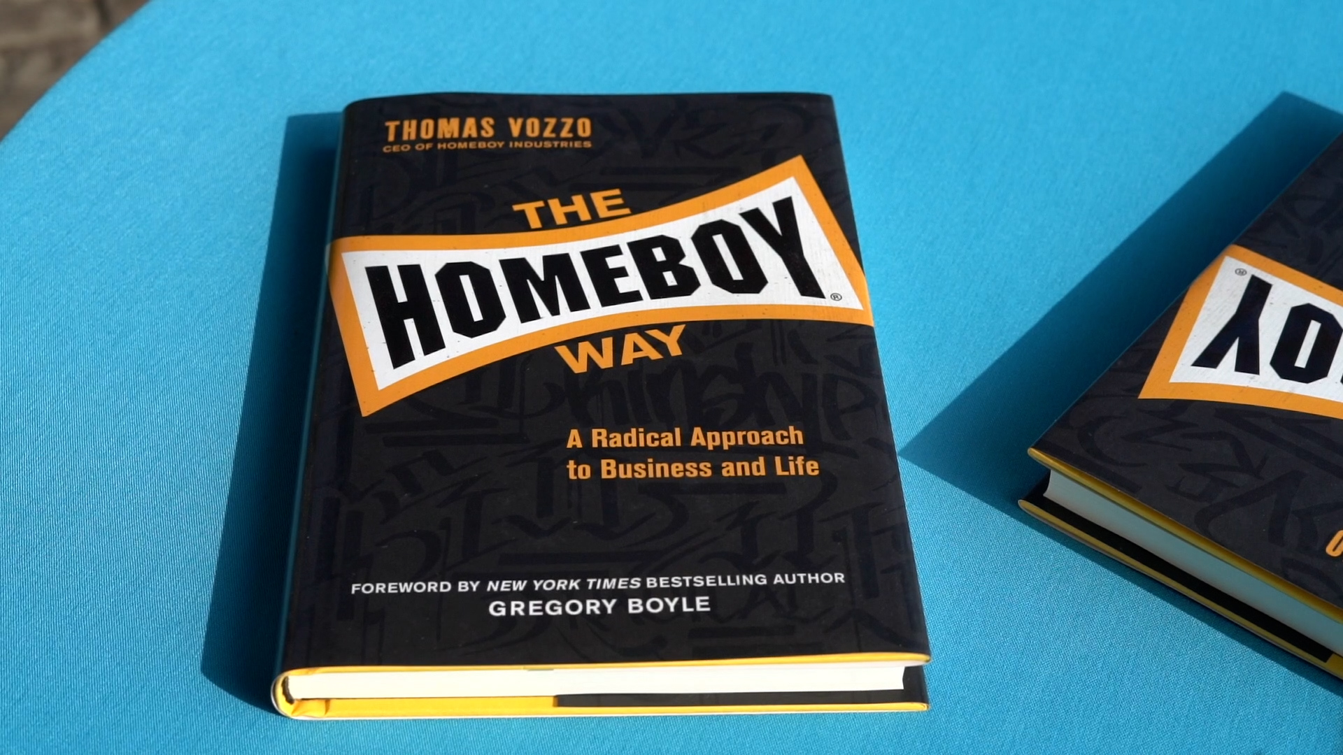 picture of book on table at homeboy way book launch